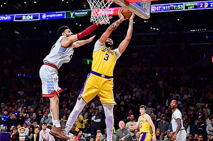 May 22, 2023; Los Angeles, California, USA; Los Angeles Lakers forward Anthony Davis (3) is fouled by Denver Nuggets guard Jamal Murray (27) during the fourth quarter in game four of the Western Conference Finals for the 2023 NBA playoffs at Crypto.com Arena. Mandatory Credit: Gary A. Vasquez-USA TODAY Sports