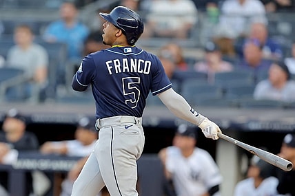 Aug 2, 2023; Bronx, New York, USA; Tampa Bay Rays shortstop Wander Franco (5) follows through on a two run home run against the New York Yankees during the first inning at Yankee Stadium. Mandatory Credit: Brad Penner-USA TODAY Sports