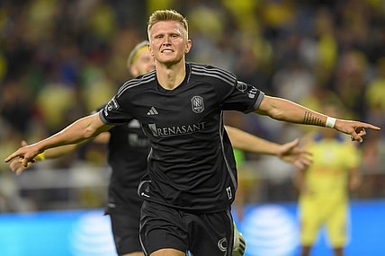 Aug 8, 2023; Nashville, TN, USA;  Nashville SC forward Sam Surridge (9) celebrates his goal against the Club America during the second half at GEODIS Park. Mandatory Credit: Steve Roberts-USA TODAY Sports