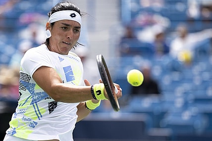 Aug 15, 2023; Mason, OH, USA; Ons Jabeur, of Tunisia, returns to Angelina Kalinina, of Ukraine, during the Western & Southern Open at Lindner Family Tennis Center. Mandatory Credit: Albert Cesare-USA TODAY Sports