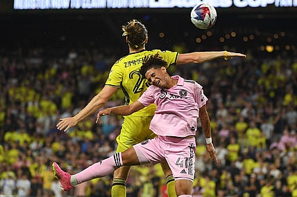 Aug 19, 2023; Nashville, TN, USA; Inter Miami midfielder David Ruiz (41) and Nashville SC defender Walker Zimmerman (25) head the ball during the second half for the Leagues Cup Championship match at GEODIS Park. Mandatory Credit: Christopher Hanewinckel-USA TODAY Sports