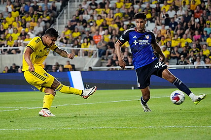 Aug 20, 2023; Columbus, Ohio, USA; Columbus Crew forward Cucho Hernandez (9) takes a shot past FC Cincinnati defender Ian Murphy (32) in the second half of the MLS soccer match at Lower.com Field.