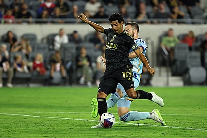 Aug 23, 2023; Los Angeles, California, USA;  Los Angeles FC forward Carlos Vela (10) scores a goal during the first half against the Colorado Rapids at BMO Stadium. Mandatory Credit: Kiyoshi Mio-USA TODAY Sports
