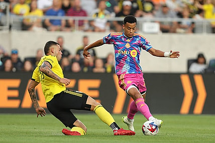 Aug 26, 2023; Columbus, Ohio, USA; Toronto FC midfielder Brandon Servania (23) in action against Columbus Crew SC forward Christian Ramirez (17) during the first half at Lower.com Field. Mandatory Credit: Joseph Maiorana-USA TODAY Sports