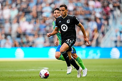 Aug 27, 2023; Saint Paul, Minnesota, USA; Minnesota United midfielder Hassani Dotson (31) dribbles during the second half against Seattle Sounders at Allianz Field. Mandatory Credit: Brace Hemmelgarn-USA TODAY Sports