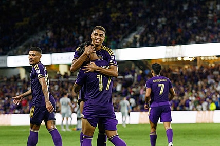 Aug 26, 2023; Orlando, Florida, USA; Orlando City SC midfielder Facundo Torres (17) and defender Rafael Santos (3) celebrate goal against St. Louis CITY SC in the second half at Exploria Stadium. Mandatory Credit: Morgan Tencza-USA TODAY Sports