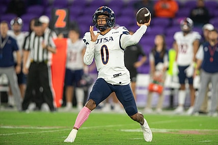 Dec 16, 2022; Orlando, Florida, USA; UTSA Roadrunners quarterback Frank Harris (0) throws the ball against the Troy Trojans in the third quarter at Exploria Stadium. Mandatory Credit: Jeremy Reper-USA TODAY Sports