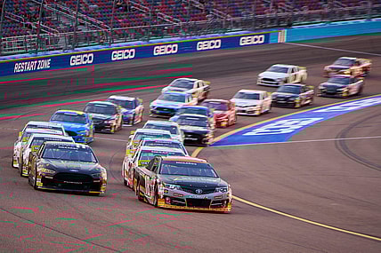 Mar 10, 2023; Avondale, AZ, USA; NASCAR ARCA Menards Series driver William Sawalich (18) leads the pack through turn 4 during the ARCA Menards General Tire 150 on Friday, March 10, 2023, at Phoenix Raceway. Mandatory Credit: Alex Gould/The Republic

Nascar Araca Race At Phoenix Raceway