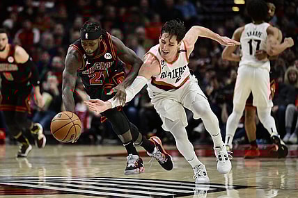 Mar 24, 2023; Portland, Oregon, USA; Chicago Bulls guard Patrick Beverley (21) steals the basketball away from Portland Trail Blazers guard Ryan Arcidiacono (51) during the first half at Moda Center. Mandatory Credit: Troy Wayrynen-USA TODAY Sports