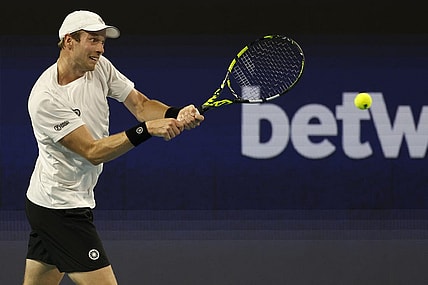 Mar 26, 2023; Miami, Florida, US; Botic van de Zandschulp (NED) hits a backhand against Casper Ruud (NOR) (not pictured) on day seven of the Miami Open at Hard Rock Stadium. Mandatory Credit: Geoff Burke-USA TODAY Sports