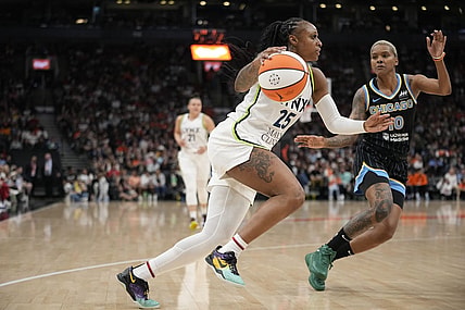 May 13, 2023; Toronto, Ontario, Canada; Minnesota Lynx guard Tiffany Mitchell (25) drives to the net against Chicago Sky guard Courtney Williams (10) during the second half at Scotiabank Arena. Mandatory Credit: John E. Sokolowski-USA TODAY Sports