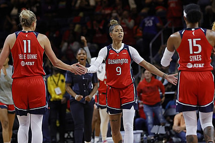 May 19, 2023; Washington, District of Columbia, USA; Washington Mystics guard Natasha Cloud (9) celebrates with Mystics forward Elena Delle Donne (11) and Mystics guard Brittney Sykes (15) in the fourth quarter at Entertainment & Sports Arena. Mandatory Credit: Geoff Burke-USA TODAY Sports