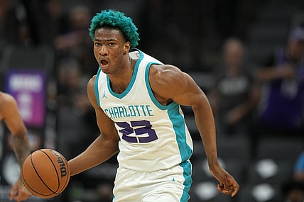 Jul 5, 2023; Sacramento, CA, USA; Charlotte Hornets forward Kai Jones (23) dribbles against the Golden State Warriors during the third quarter at Golden 1 Center. Mandatory Credit: Darren Yamashita-USA TODAY Sports