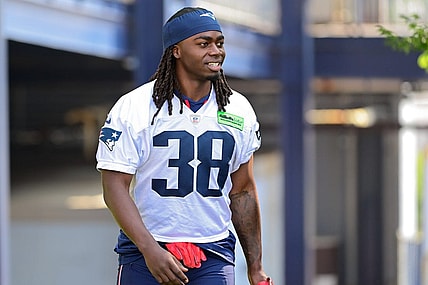 Jul 26, 2023; Foxborough, MA, USA; New England Patriots running back Rhamondre Stevenson (38) makes his way to the practice fields for  training camp at Gillette Stadium. Mandatory Credit: Eric Canha-USA TODAY Sports