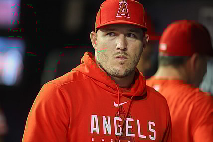 Aug 1, 2023; Atlanta, Georgia, USA; Los Angeles Angels outfielder Mike Trout (27) in the dugout against the Atlanta Braves in the seventh inning at Truist Park. Mandatory Credit: Brett Davis-USA TODAY Sports
