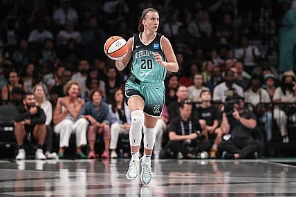 Aug 6, 2023; Brooklyn, New York, USA; New York Liberty guard Sabrina Ionescu (20) brings the ball up in the first quarter against the Las Vegas Aces at Barclays Center. Mandatory Credit: Wendell Cruz-USA TODAY Sports