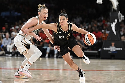 Aug 15, 2023; Las Vegas, Nevada, USA; New York Liberty guard Courtney Vandersloot (22) defends against Las Vegas Aces guard Kelsey Plum (10) during the fourth quarter at Michelob Ultra Arena. Mandatory Credit: Candice Ward-USA TODAY Sports