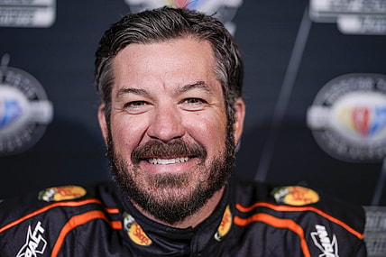 Aug 31, 2023; Charlotte, North Carolina, USA; Martin Truex Jr. answers questions from the media at Charlotte Convention Center. Mandatory Credit: Jim Dedmon-USA TODAY Sports