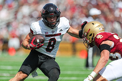 Sep 2, 2023; Chestnut Hill, Massachusetts, USA; Northern Illinois Huskies receiver Kacper Rutkiewicz (8) runs the ball during the first half against the Boston College Eagles at Alumni Stadium. Mandatory Credit: Paul Rutherford-USA TODAY Sports
