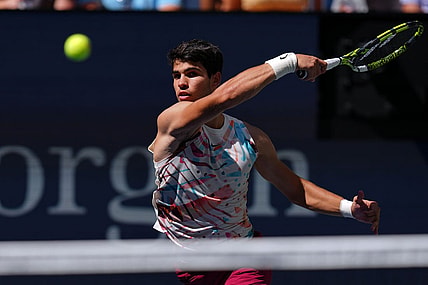 Sep 2, 2023; Flushing, NY, USA; Carlos Alcaraz of Spain hits to Daniel Evans of Great Britain on day six of the 2023 U.S. Open tennis tournament at USTA Billie Jean King National Tennis Center. Mandatory Credit: Danielle Parhizkaran-USA TODAY Sports