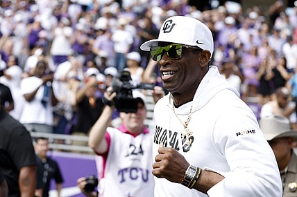 Sep 2, 2023; Fort Worth, Texas, USA; Colorado Buffaloes head coach Deion Sanders runs on the field before the game against the TCU Horned Frogs at Amon G. Carter Stadium. Mandatory Credit: Tim Heitman-USA TODAY Sports