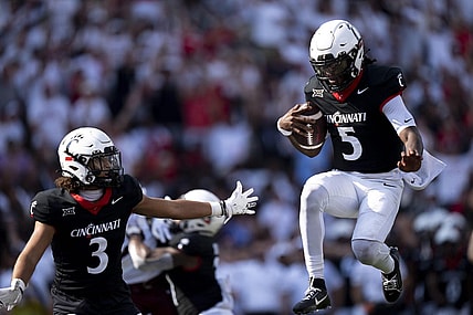Sep 2, 2023; Cincinnati, Ohio, USA; Cincinnati Bearcats quarterback Emory Jones (5) celebrates after scoring a touchdown as Cincinnati Bearcats wide receiver Evan Prater (3) celebrates with him in the second quarter of the NCAA football game between the Cincinnati Bearcats and the Eastern Kentucky Colonels at Nippert Stadium. Mandatory Credit: Albert Cesare-USA TODAY Sports
