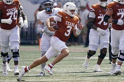 Sep 2, 2023; Austin, Texas, USA; Texas Longhorns quarterback Quinn Ewers (3) keeps the ball for yardage during the first half against the Rice Owls at Darrell K Royal-Texas Memorial Stadium. Mandatory Credit: Scott Wachter-USA TODAY Sports