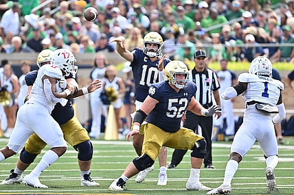 Sep 2, 2023; South Bend, Indiana, USA; Notre Dame Fighting Irish quarterback Sam Hartman (10) throws in the second quarter against the Tennessee State Tigers at Notre Dame Stadium. Mandatory Credit: Matt Cashore-USA TODAY Sports