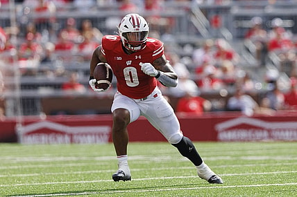 Sep 2, 2023; Madison, Wisconsin, USA;  Wisconsin Badgers running back Braelon Allen (0) rushes with the football during the second quarter against the Buffalo Bulls at Camp Randall Stadium. Mandatory Credit: Jeff Hanisch-USA TODAY Sports
