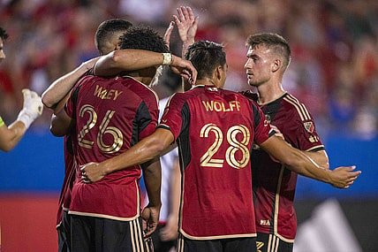 Sep 2, 2023; Frisco, Texas, USA; Atlanta United forward Giorgos Giakoumakis (7) and midfielder Saba Lobjanidze (9) and defender Caleb Wiley (26) and forward Tyler Wolff (28) celebrate after Giakoumakis scores a goal against FC Dallas during the first half at Toyota Stadium. Mandatory Credit: Jerome Miron-USA TODAY Sports