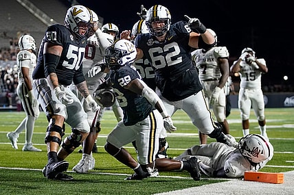 Vanderbilt running back Sedrick Alexander (28) reacts after scoring a touchdown against Alabama A&M during the fourth quarter at FirstBank Stadium in Nashville, Tenn., Saturday, Sept. 2, 2023.during the fourth quarter at FirstBank Stadium in Nashville, Tenn., Saturday, Sept. 2, 2023.