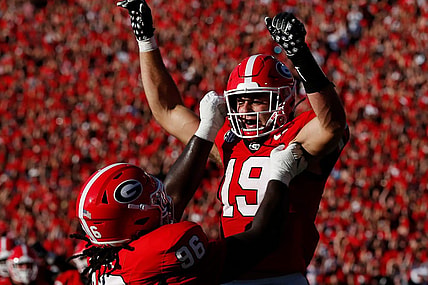 Georgia tight end Brock Bowers (19) celebrates with his teammates after scoring a touchdown during the first half of a NCAA college football game against Tennessee Martin in Athens, Ga., on Saturday, Sept. 2, 2023.