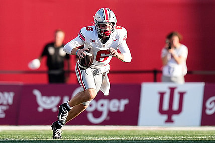 Sep 2, 2023; Bloomington, Indiana, USA; Ohio State Buckeyes quarterback Kyle McCord (6) scrambles during the NCAA football game at Indiana University Memorial Stadium. Ohio State won 23-3.