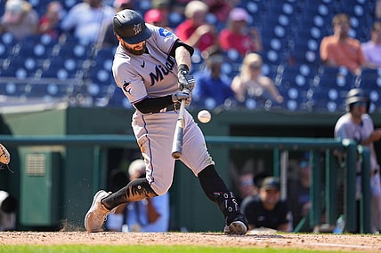 Sep 3, 2023; Washington, District of Columbia, USA;  Miami Marlins third baseman Jon Berti (5) hits a single against the Washington Nationals during the sixth inning at Nationals Park. Mandatory Credit: Gregory Fisher-USA TODAY Sports