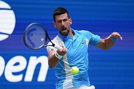 Sep 5, 2023; Flushing, NY, USA; Novak Djokovic of Serbia hits to Taylor Fritz of the United States on day nine of the 2023 U.S. Open tennis tournament at USTA Billie Jean King National Tennis Center. Mandatory Credit: Danielle Parhizkaran-USA TODAY Sports