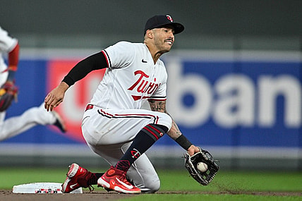 Aug 26, 2023; Minneapolis, Minnesota, USA; Minnesota Twins shortstop Carlos Correa (4) in action against the Texas Rangers during the eighth inning at Target Field. Mandatory Credit: Jeffrey Becker-USA TODAY Sports