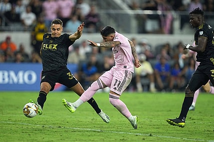 Sep 3, 2023; Los Angeles, California, USA; Inter Miami CF midfielder Facundo Far  as (11) moves the ball against LAFC defender Aaron Long (33) at BMO Stadium. Mandatory Credit: Kirby Lee-USA TODAY Sports