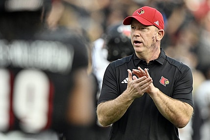 Sep 7, 2023; Louisville, Kentucky, USA; Louisville Cardinals head coach Jeff Brohm watches warmups before facing off against the Murray State Racers at L&N Federal Credit Union Stadium. Mandatory Credit: Jamie Rhodes-USA TODAY Sports