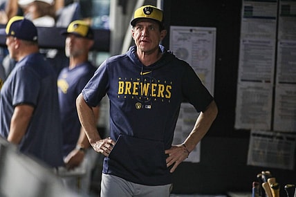 Sep 8, 2023; Bronx, New York, USA;  Milwaukee Brewers manager Craig Counsell (30) looks out from the dugout in the first inning against the New York Yankees at Yankee Stadium. Mandatory Credit: Wendell Cruz-USA TODAY Sports