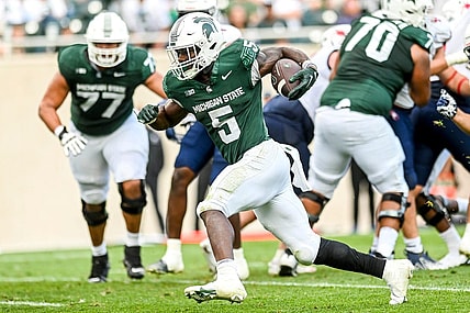 Michigan State's Nathan Carter runs for his third touchdown in the third quarter against Richmond on Saturday, Sept. 9, 2023, at Spartan Stadium in East Lansing.