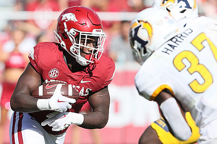 Sep 9, 2023; Fayetteville, Arkansas, USA; Arkansas Razorbacks running back Rashod Dubinion (7) rushes in the third quarter against the Kent State Golden Flashes at Donald W. Reynolds Razorback Stadium. Arkansas won 28-6. Mandatory Credit: Nelson Chenault-USA TODAY Sports