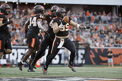 Sep 9, 2023; Corvallis, Oregon, USA; Oregon State Beavers defensive lineman Isaac Hodgins (99) celebrates after recovering a fumble against the UC Davis Aggies during the first half at Reser Stadium. Mandatory Credit: Soobum Im-USA TODAY Sports