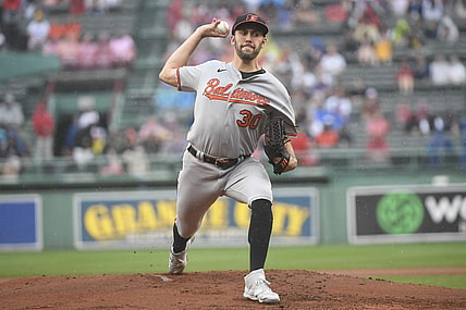 Sep 10, 2023; Boston, Massachusetts, USA;  Baltimore Orioles starting pitcher Grayson Rodriguez (30) pitches during the first inning against the Boston Red Sox at Fenway Park. Mandatory Credit: Bob DeChiara-USA TODAY Sports