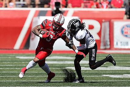 Sep 16, 2023; Salt Lake City, Utah, USA; Utah Utes running back Ja'Quinden Jackson (3) runs against Weber State Wildcats cornerback Jalon Rock (23) in the second half at Rice-Eccles Stadium. Mandatory Credit: Rob Gray-USA TODAY Sports