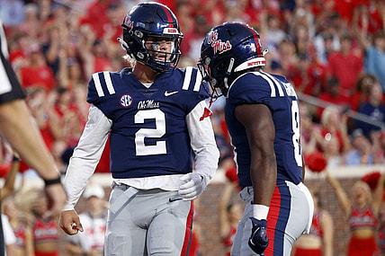 Sep 16, 2023; Oxford, Mississippi, USA; Mississippi Rebels quarterback Jaxson Dart (2) reacts with running back Jam Griffin (8) after a touchdown during the first half against the Georgia Tech Yellow Jackets at Vaught-Hemingway Stadium. Mandatory Credit: Petre Thomas-USA TODAY Sports