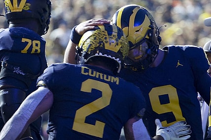 Sep 16, 2023; Ann Arbor, Michigan, USA;  Michigan Wolverines running back Blake Corum (2) celebrates with quarterback J.J. McCarthy (9) after scoring a touchdown against the Bowling Green Falcons in the first half at Michigan Stadium. Mandatory Credit: Rick Osentoski-USA TODAY Sports