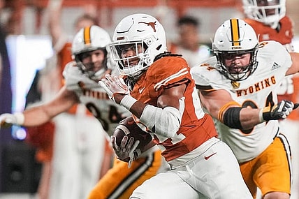 Texas Longhorns running back Jonathon Brooks (24) runs the ball forward during the Texas Longhorns' game against the Wyoming Cowboys, Saturday, Sept. 16 at Darrell K Royal   Texas Memorial Stadium in Austin.
