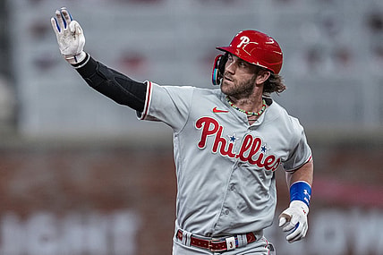 Sep 18, 2023; Cumberland, Georgia, USA; Philadelphia Phillies first baseman Bryce Harper (3) reacts as he runs the bases after hitting a home run against the Atlanta Braves during the third inning at Truist Park. Mandatory Credit: Dale Zanine-USA TODAY Sports