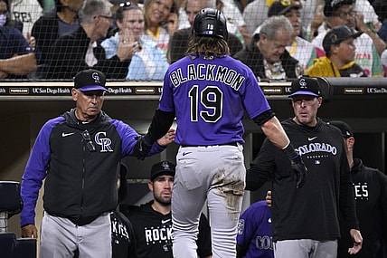 Sep 18, 2023; San Diego, California, USA; Colorado Rockies right fielder Charlie Blackmon (19) is congratulated at the dugout by manager Bud Black (left) after scoring a run against the San Diego Padres during the third inning at Petco Park. Mandatory Credit: Orlando Ramirez-USA TODAY Sports