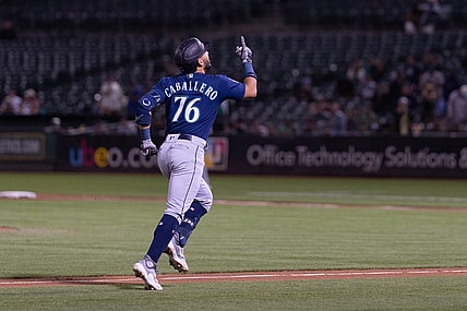 Sep 18, 2023; Oakland, California, USA;  Seattle Mariners second baseman Jose Caballero (76) celebrates after hitting a two run home run during the fourth inning against the Oakland Athletics at Oakland-Alameda County Coliseum. Mandatory Credit: Stan Szeto-USA TODAY Sports